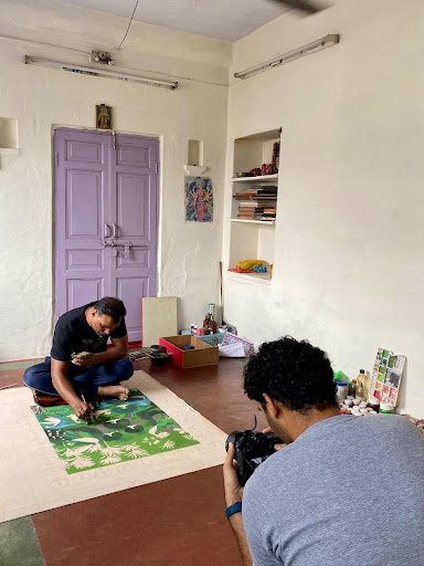 Artists of Nathdwara artist and co-founder Suresh Sharma being photographed in his studio by photographer Hashim Badani Artists of Nathdwara artist and co-founder Suresh Sharma being photographed in his studio by photographer Hashim Badani